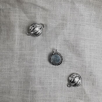 Platt runt magnetlås 23 mm silverfärgad metall