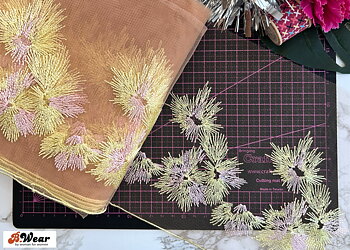 Mesh tulle lace in Beige with beautiful yellow flowers