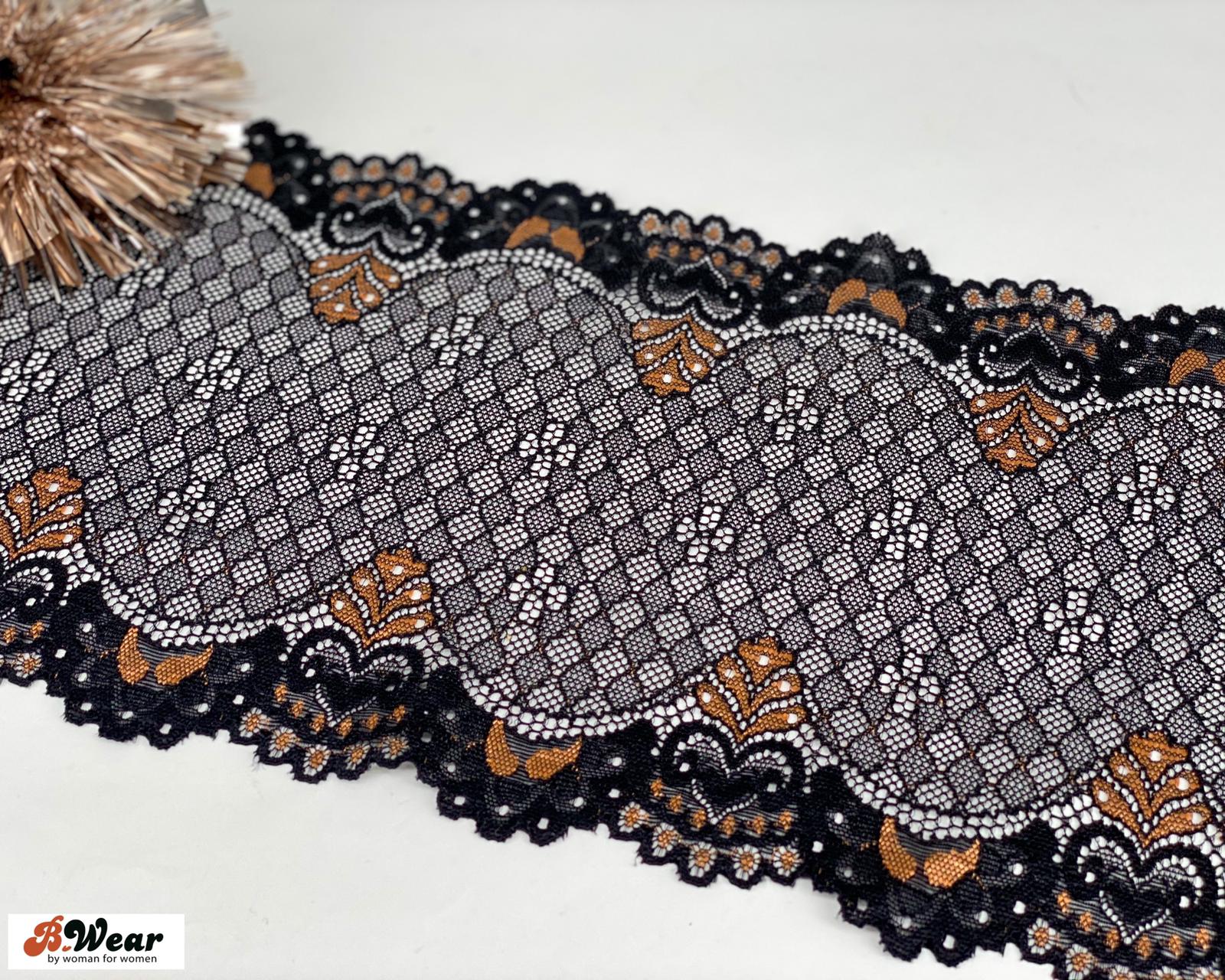 Stretch lace in black with copper coloured decorations