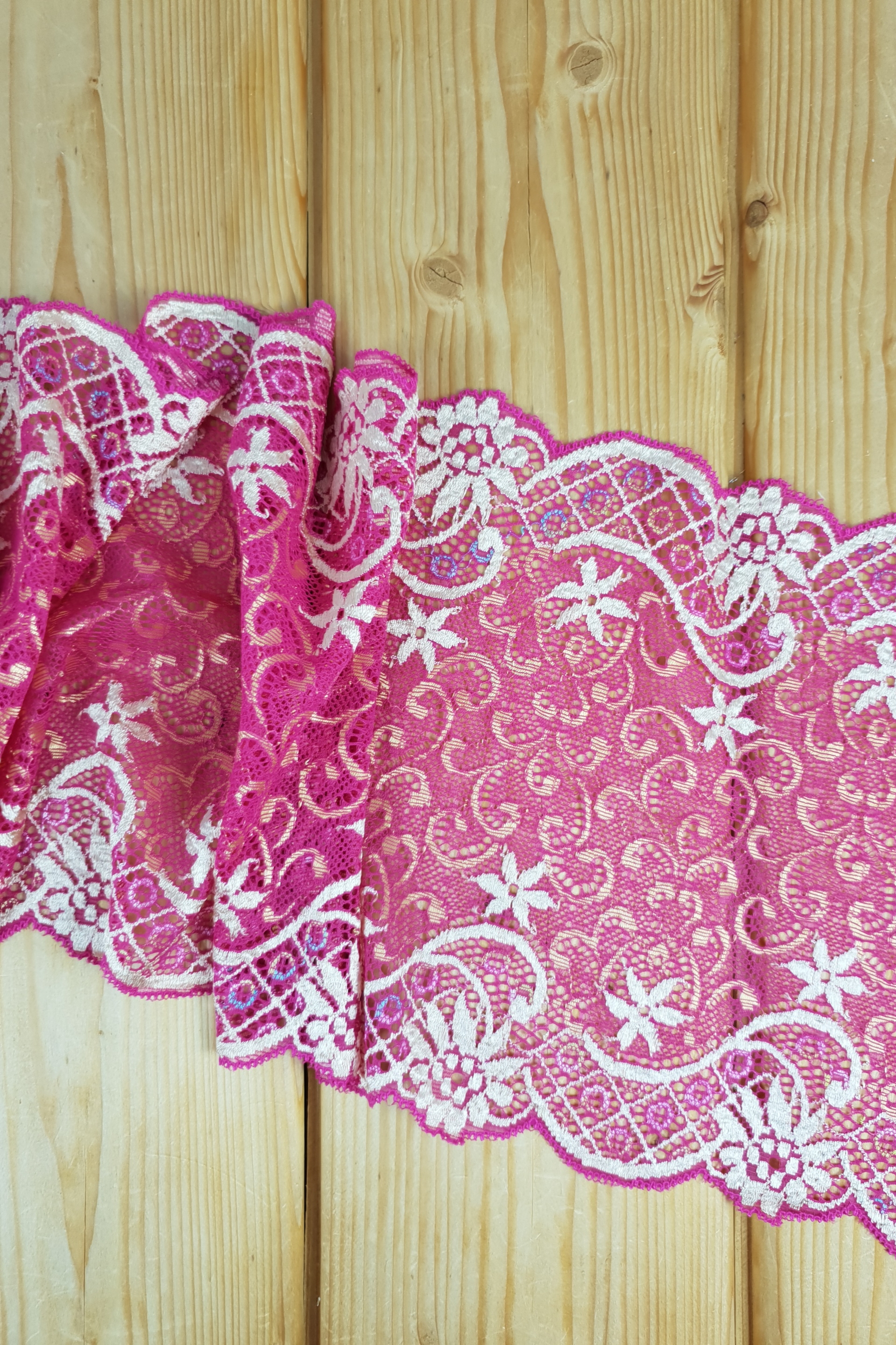Fuchsia stretch lace with lovely decorations