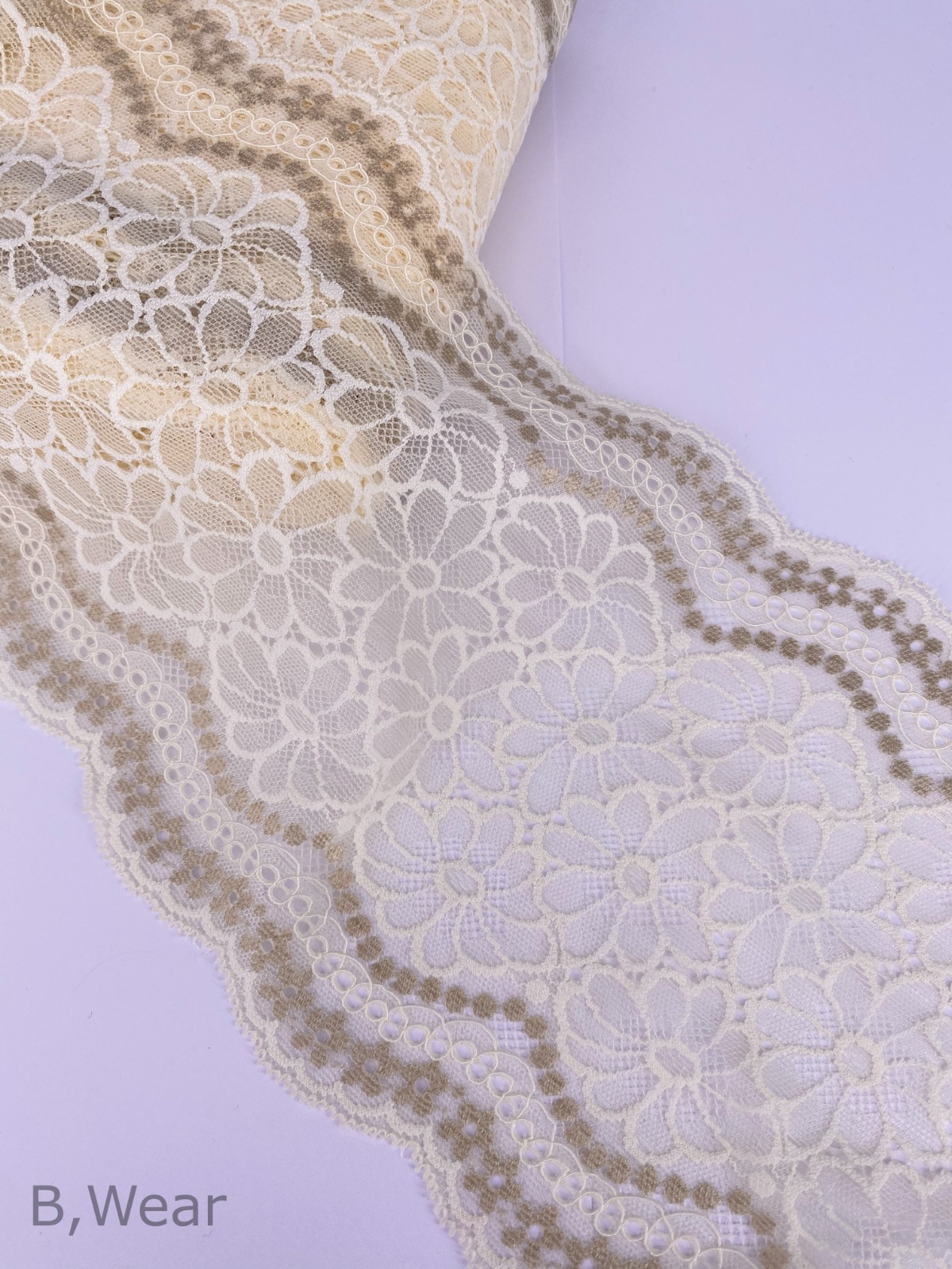 Lace in lovely Ivory with nougatcoloured flowers