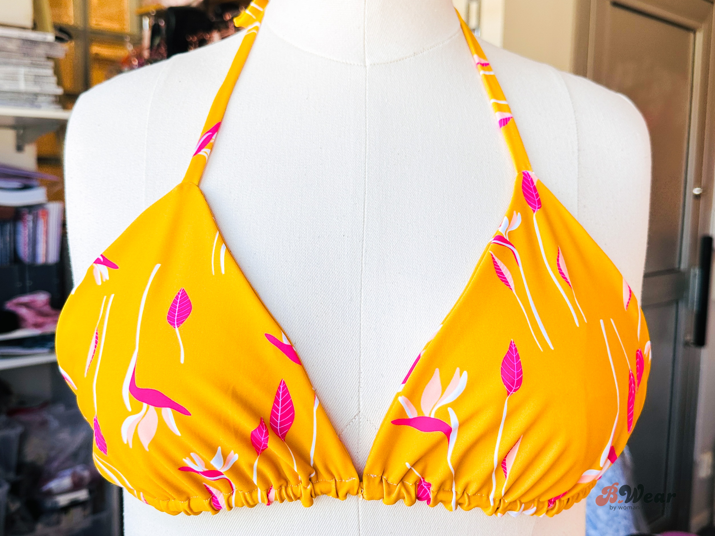 YellowOrange swimwear fabric with fuchsia & white pattern