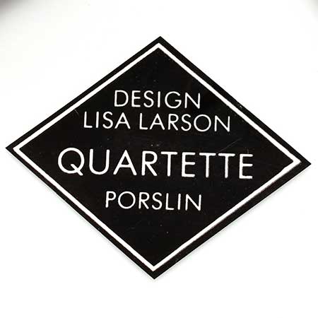 Lisa Larson Åhléns The lower side of a white Quartette vase