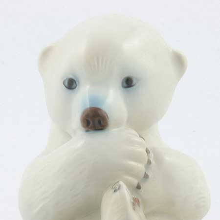 Merete Agergaard Bing & Gröndahl and Royal Copenhagen Polar bear cub on back, model 538. Manufactured by Bing & Grøndahl as model 2538 before the 1987 merger with Royal Copenhagen