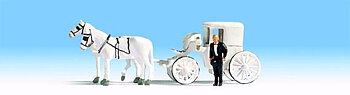 Hästar med högtidsvagn