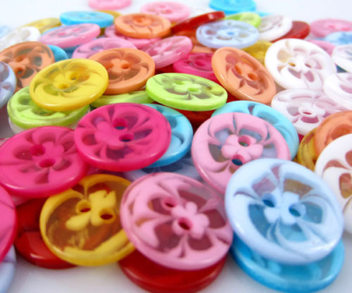 Runda plastknappar 14 mm.