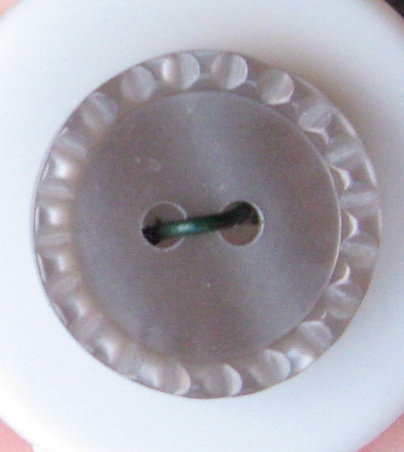 Rund plastknapp 18 mm.