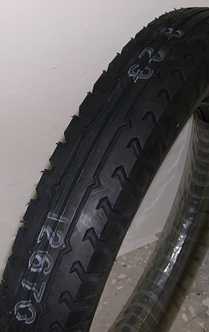 Däck  Firestone 19" svart sida