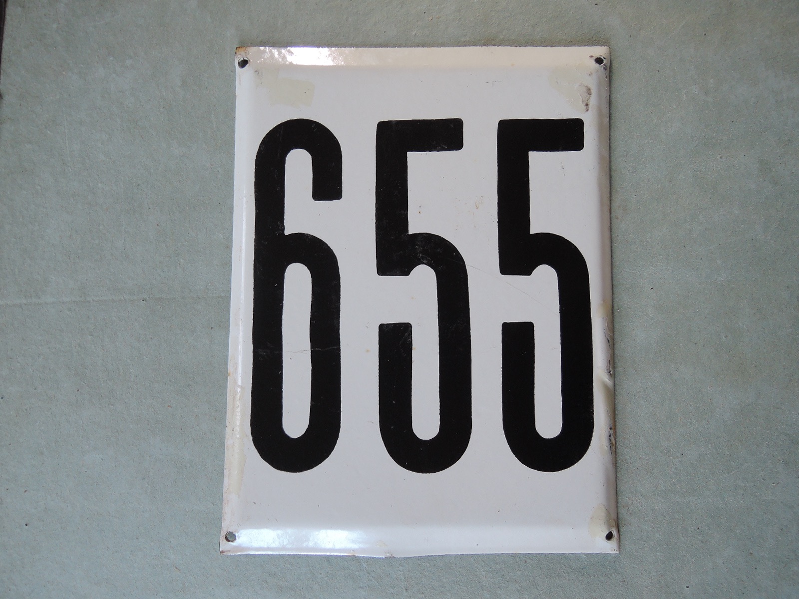 Stor gammal emaljskylt nummer 655