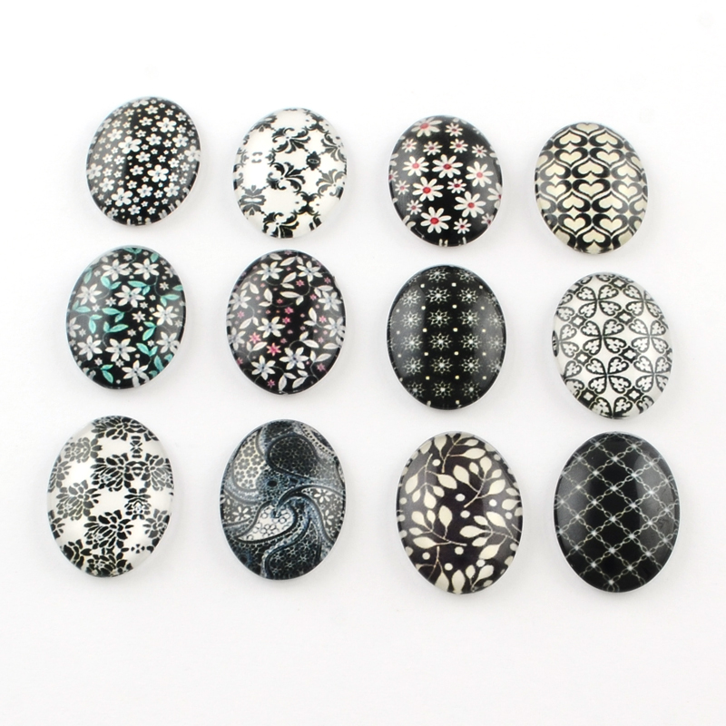 Cabochon in glass   black/whitemix 40x30mm