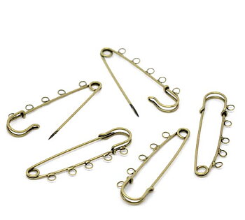 Safety pin with 5 rings, bronze  - Kiltpin
