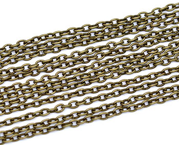 liten oval cross-Kedja, brons 3x2mm