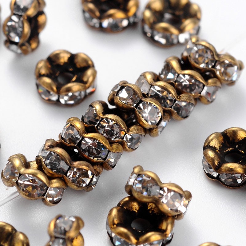 Rhinestone rondelle 6mmm,  Bronze, Clear