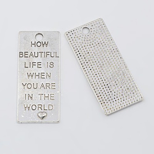 Charm tag " How beautiful life is when you are in the world"