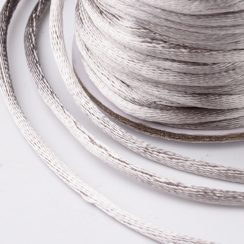 Nylon thread, 2mm. whole roll.  Silver