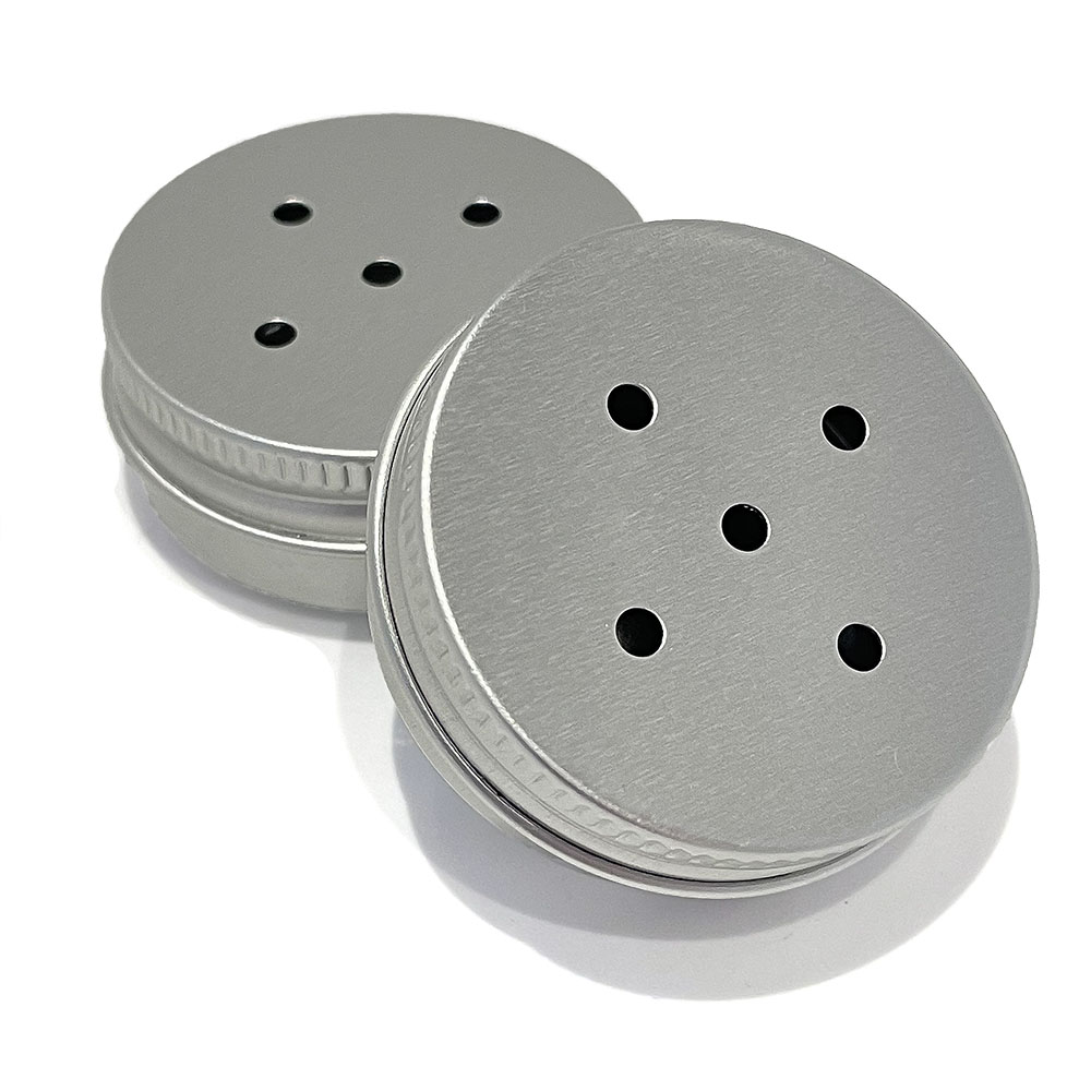 Aluminium scent container with a magnet