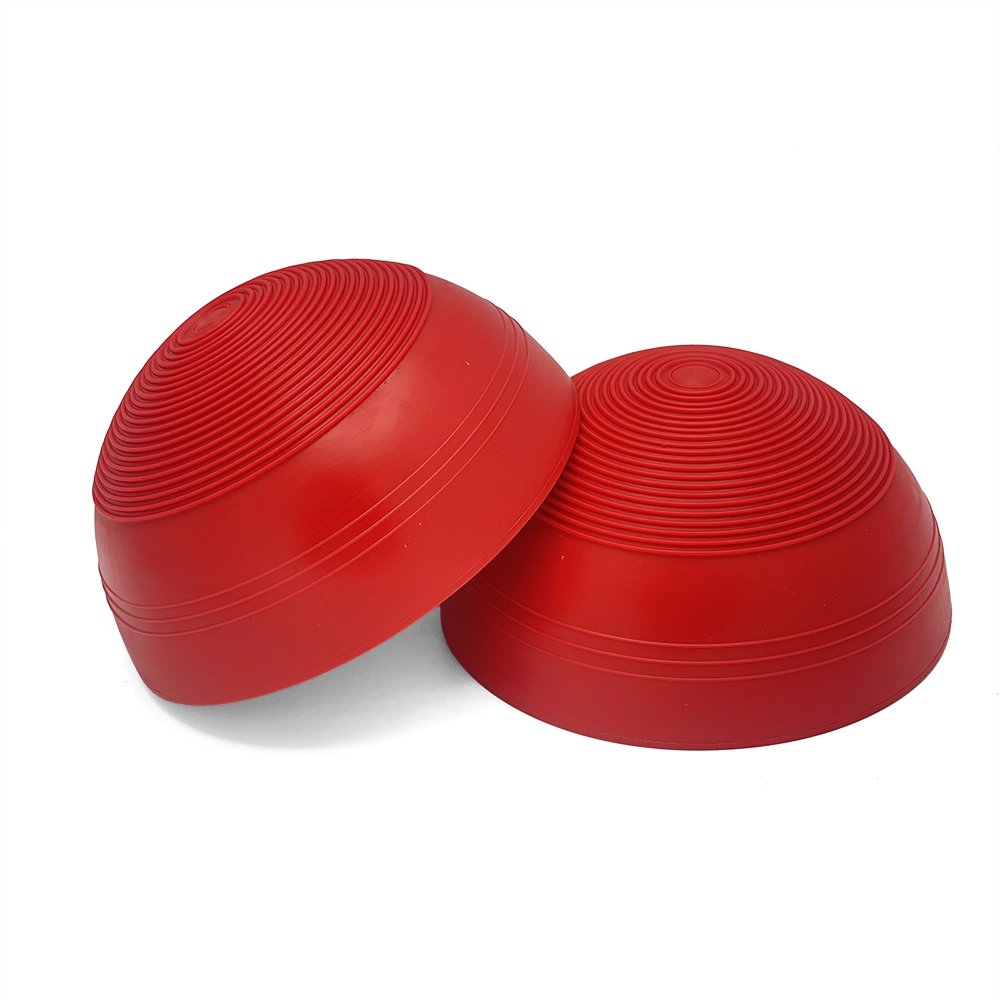 Röda halv bollar balansboll hund