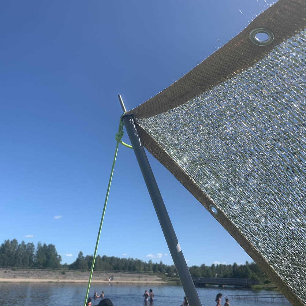Bärbar skugga med silverduk