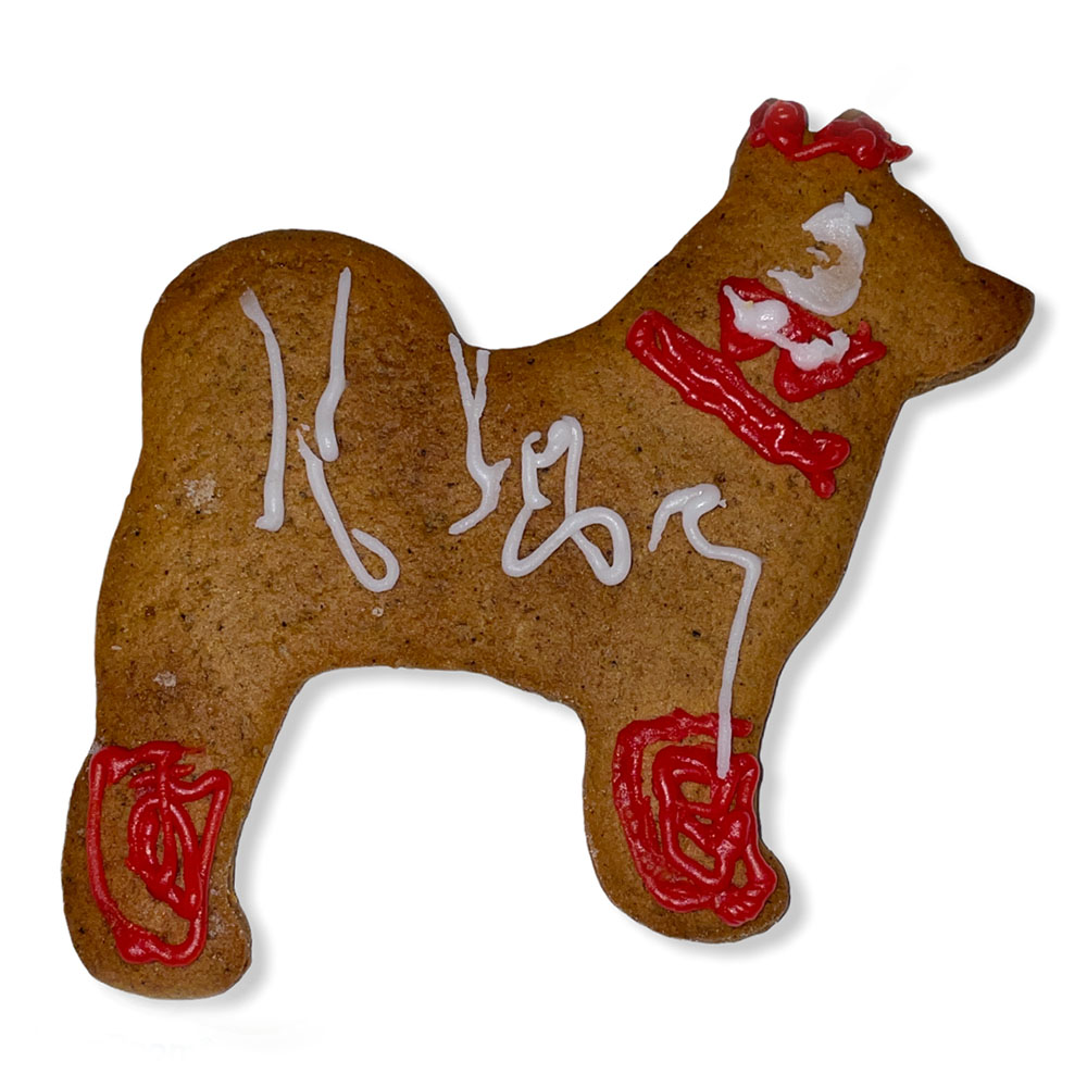 Bake a cookie in the shape of a dog spitz