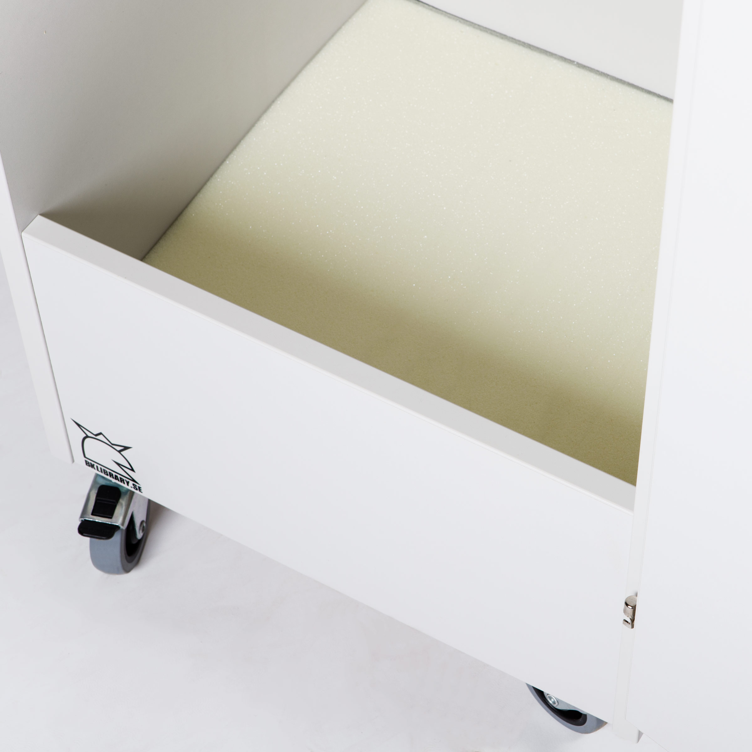 Book return unit with lockable door and slot for safe and gentle book returns in libraries