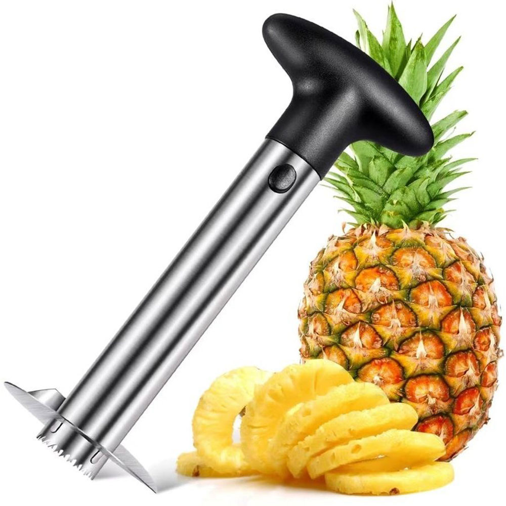 Ananasskärare med en hel ananas och en spiral av ananas