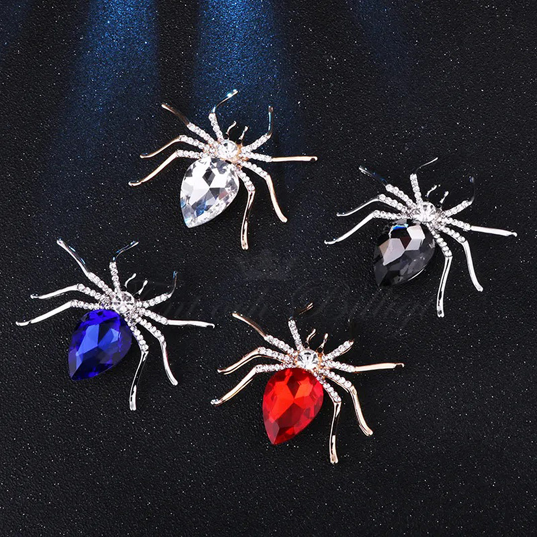 Brosch Spider Queen Spindel med stor kristall i olika färger silver och guld och smyckad med cz diamanter