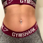 Navelpiercing i kirurgiskt stål med hänge i äkta silver och glittriga rosa kristaller som en blomma