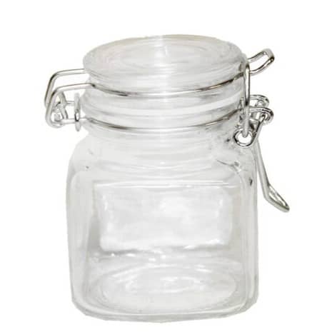 Glasburk med glaslock som har bygel
