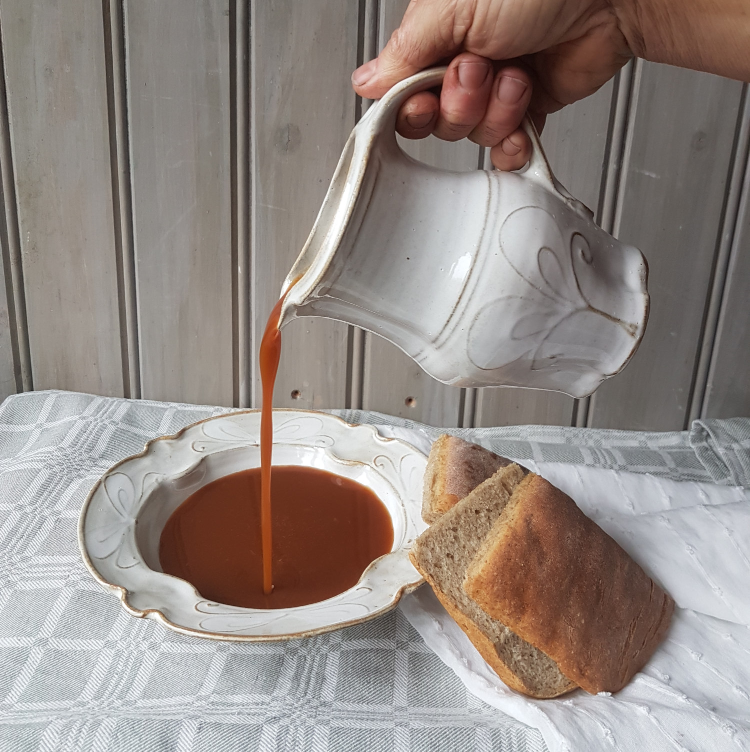 Stoneware pitcher, whitewings