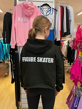 Texten "Figure Skater" i glittertryck i olika färger