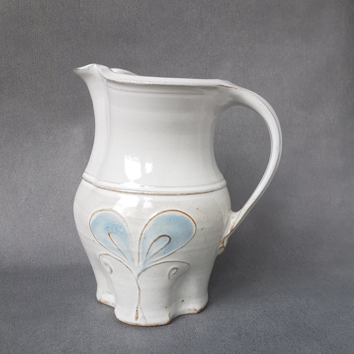 Stoneware pitcher, bluewings