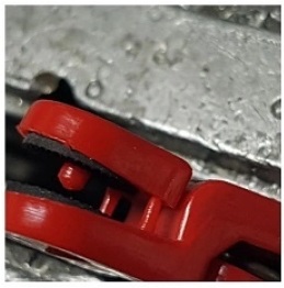 Attach the rope inside the tooth so the clamp does not come off