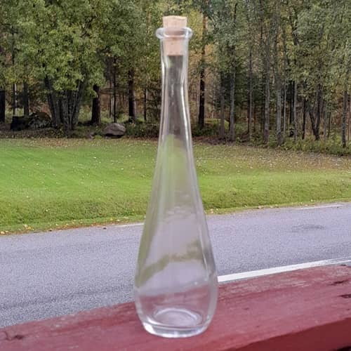Droppformad flaska i glas