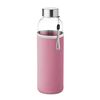 Vattenflaska av glas med rosa fodral och metallkork