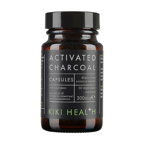 Kapslar med aktivt kol från Kiki Health i mörk glasburk