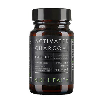 Kapslar med aktivt kol från Kiki Health i mörk glasburk