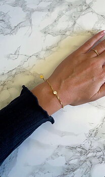 Cubic single brace gold