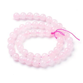 Runda rosenkvartspärlor ca 10–10,5 mm på 38 cm sträng i mjuk rosa ton.