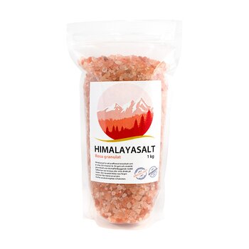 genomskinlig påse med rosa saltkorn innuti.