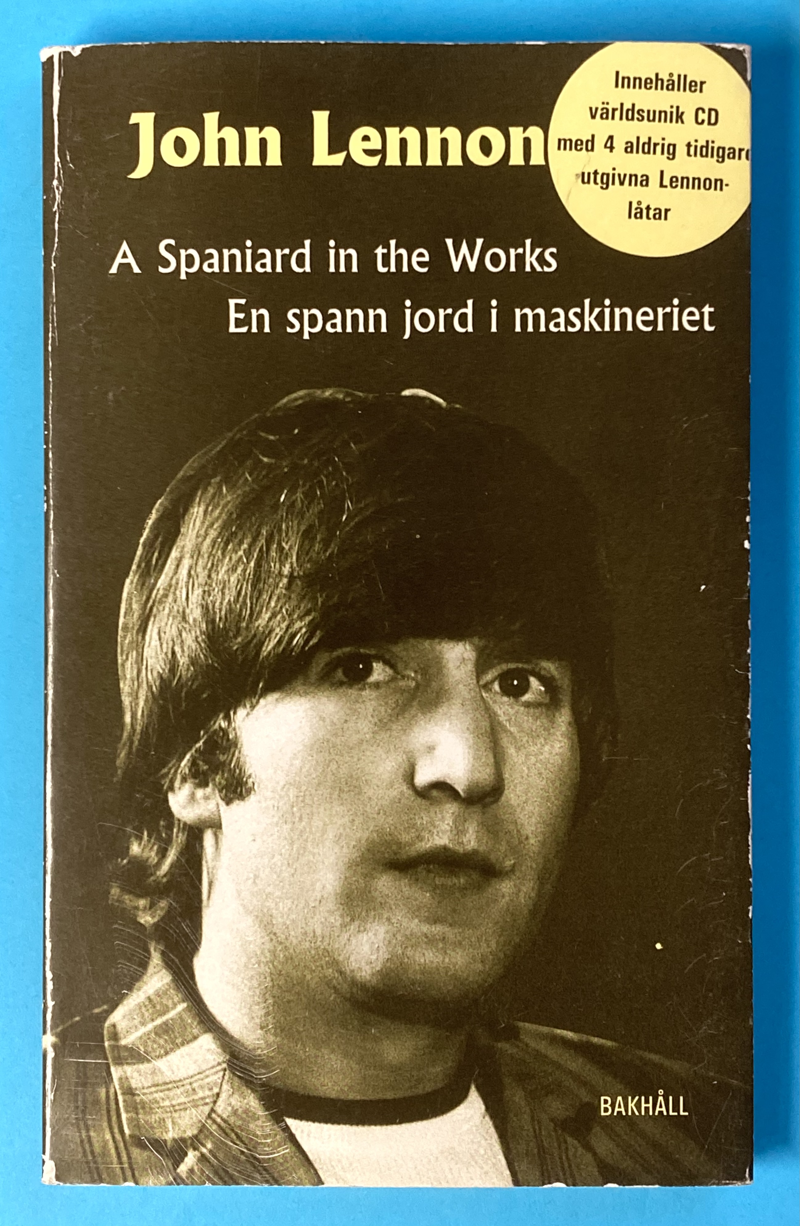 JOHN LENNON - En spann jord i maskineriet CD + BOK 1997