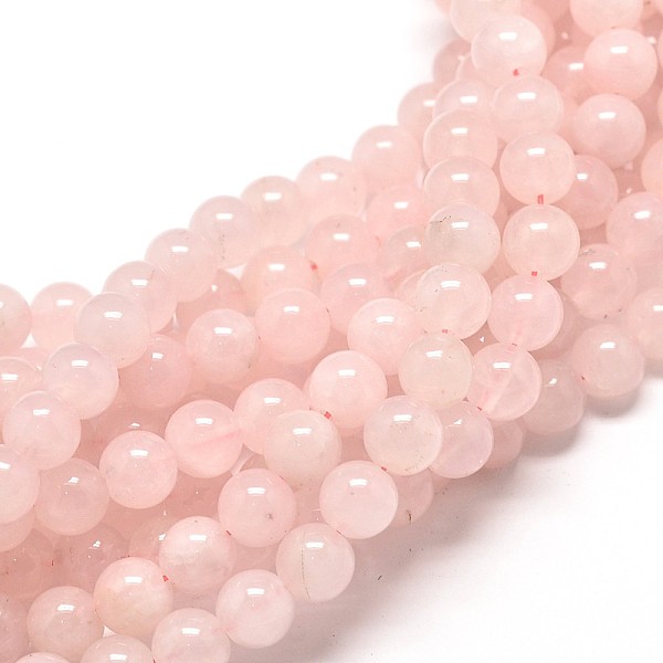 Runda rosenkvartspärlor i 8 mm-storlek, mjukt rosa, ca 46 pärlor på sträng.