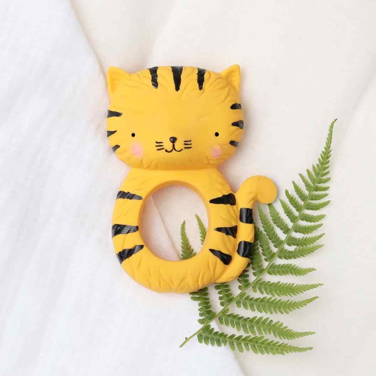 Naturgummibid i gul og sort med tigeransigt
