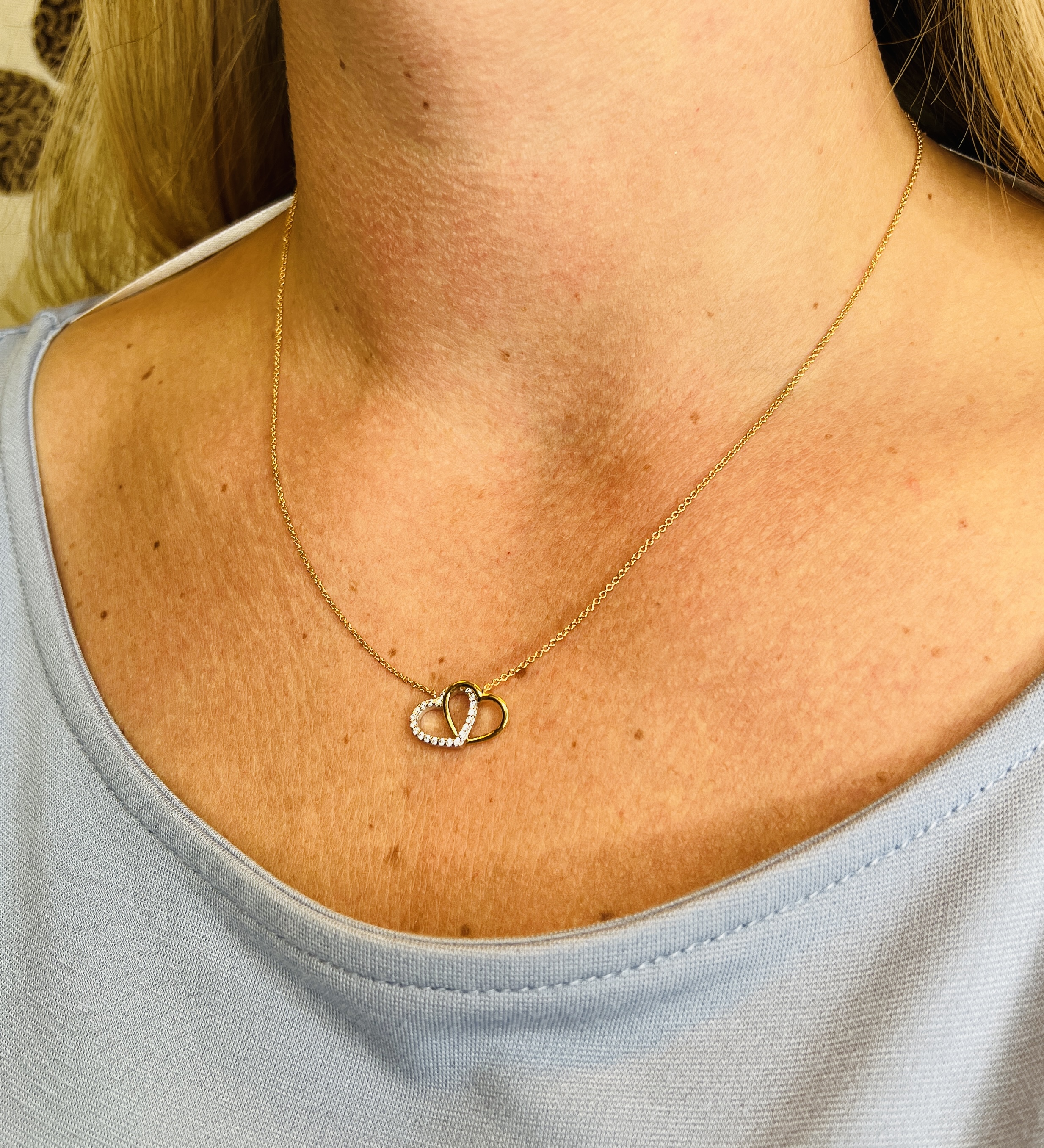 Gold necklace with two hearts - 2