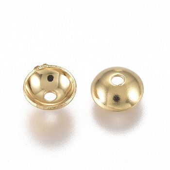 Släta pärlhattar i guldfärgat rostfritt stål, cirka 4 mm i diameter, visade i närbild.