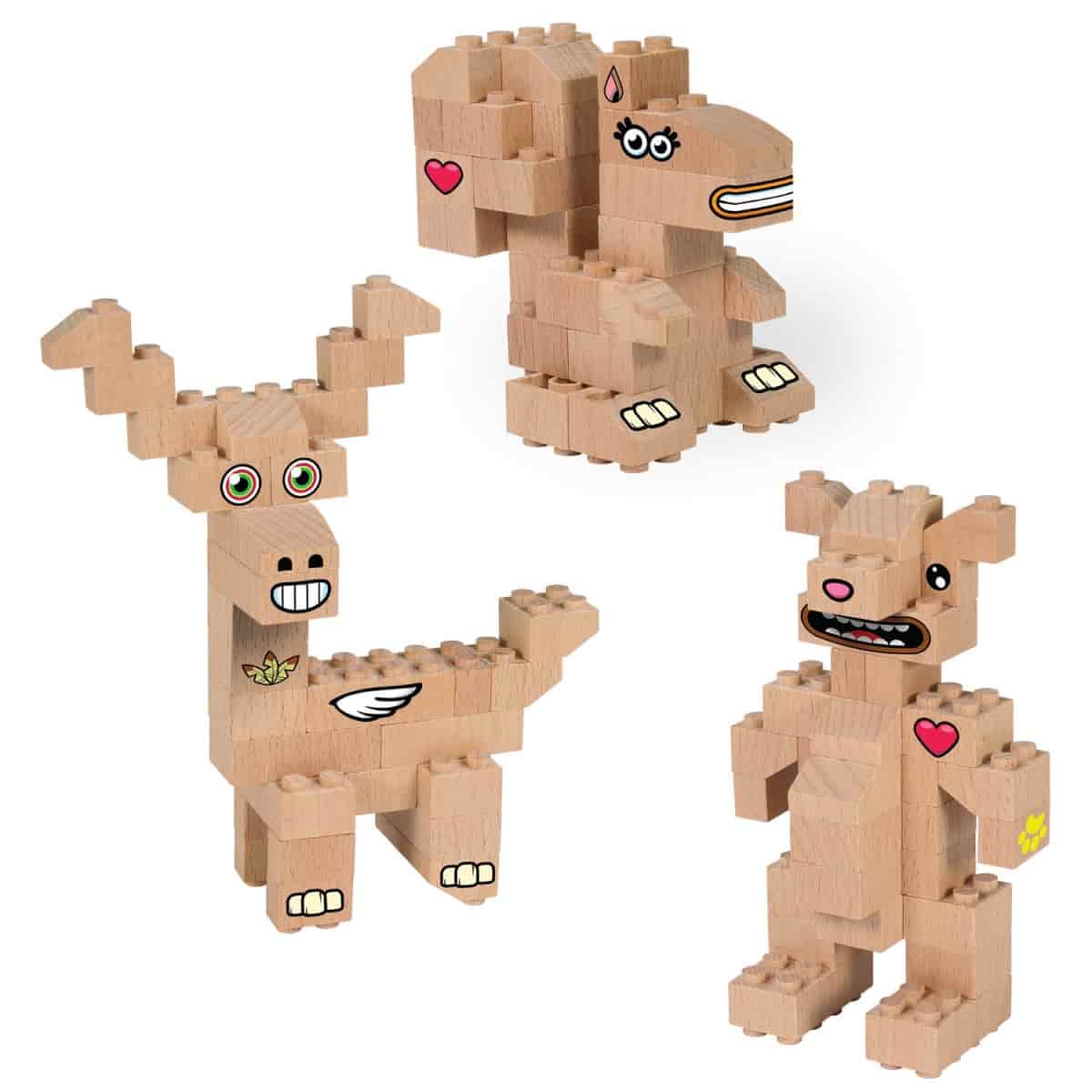 Tre dyr fra skoven bygget af træklodser, der ligner Lego