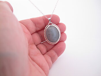 Necklace with hand cut stone 38x25mm