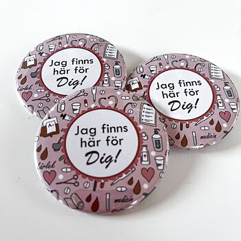 Badge/knapp "Jag finns här för dig (vårdpersonal)." 57 mm