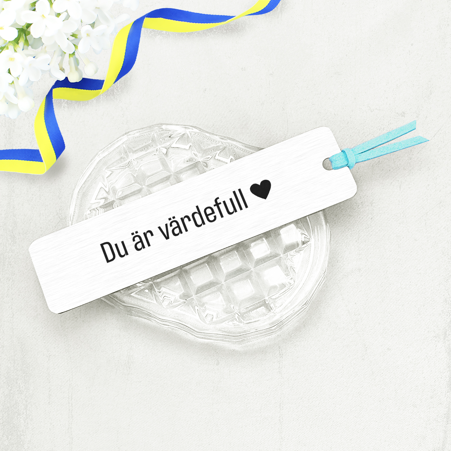 Bokmärke i stål "Du är värdefull"