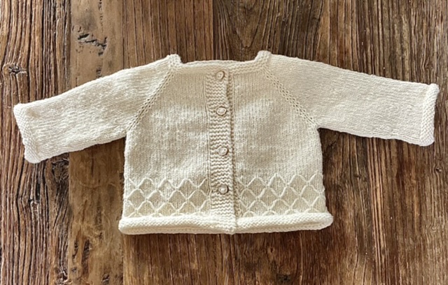 Knitting pattern "Avelsås Mini Gårdskofta"-Swedish