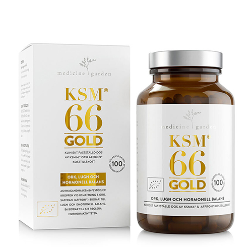 En vit pappkartong med guldtext på som säger KSM66 Gold